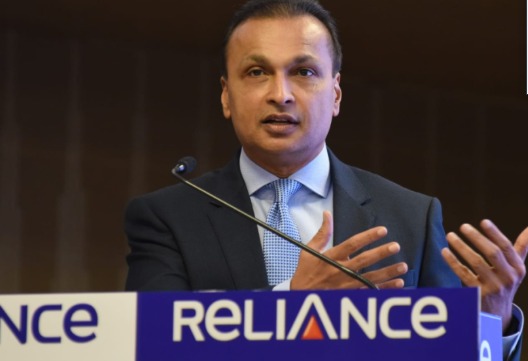 SBI headquarters and Reliance Communication logo with financial documents in background